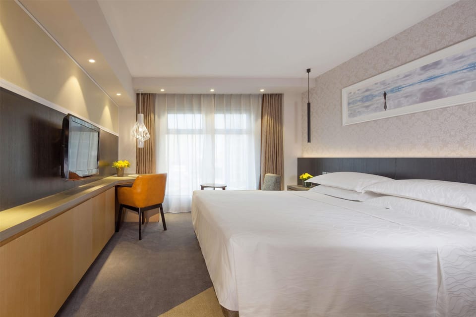 Hypo-allergenic bedding available, minibar, in-room safe, desk