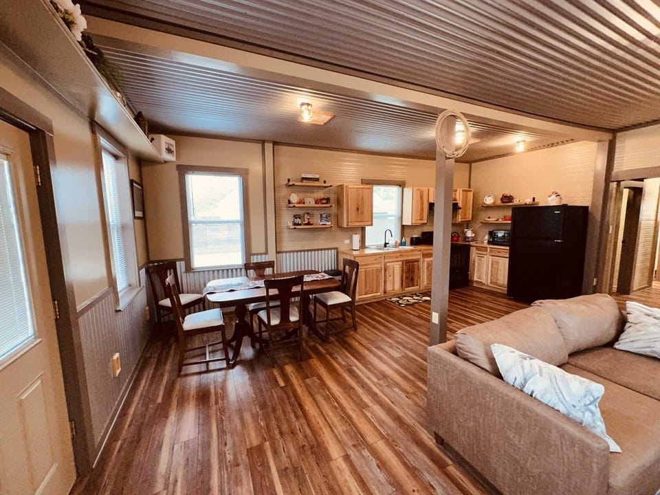 The dining area is conveniently located next to the kitchen, and seats up to six of your folks comfortably.