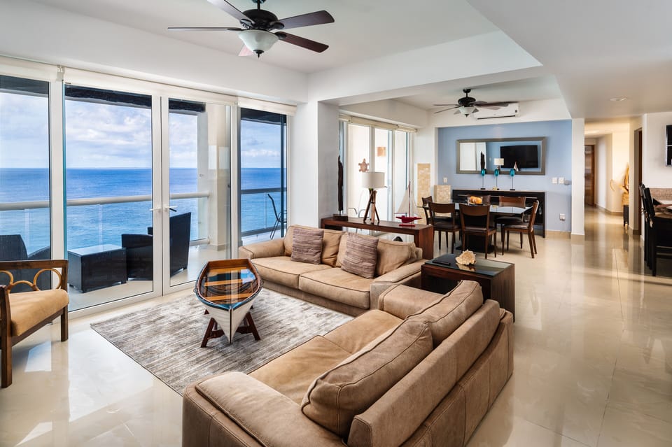 The open concept living space to entertain, dine, sip some wine