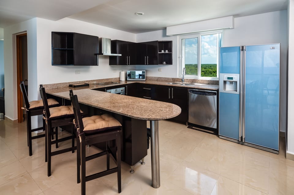 Pull up to the kitchen counter for breakfast or lay out some food