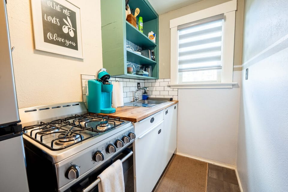 Bright and functional space with vibrant decor, perfect for culinary creations!