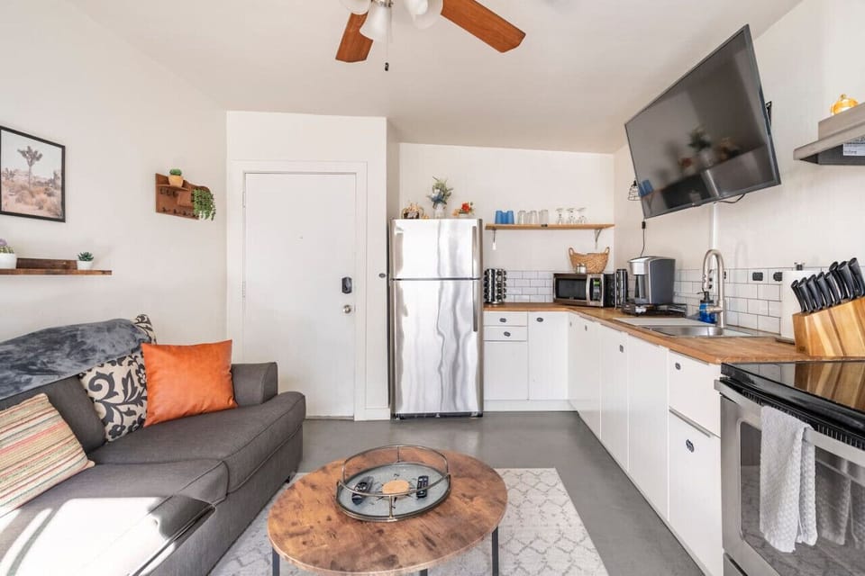 The plush sofa and flat-screen are calling your name - perfect for movie nights with friends!