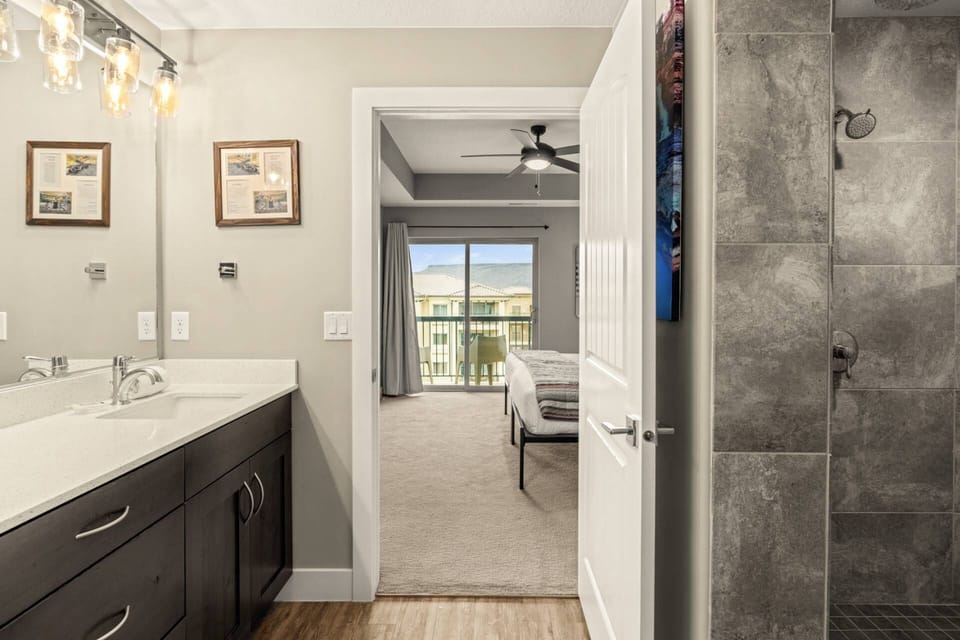 Master Bathroom is Connected to the Master Bedroom with Updated Shower and Cabinetry
