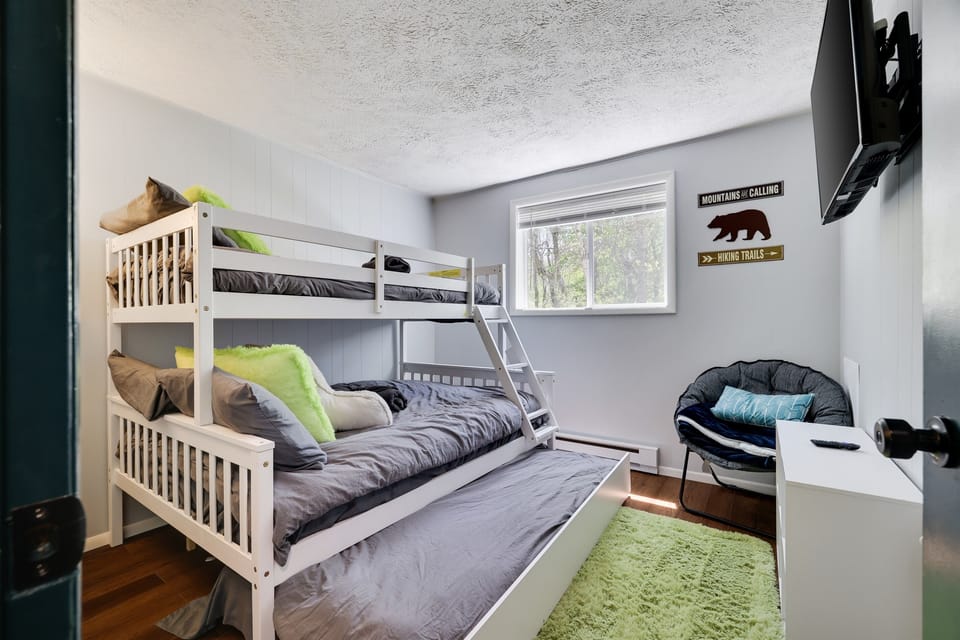 2nd floor queen/twin (plus trundle) bunk room. Bunk has a trundle for extra sleeping space
