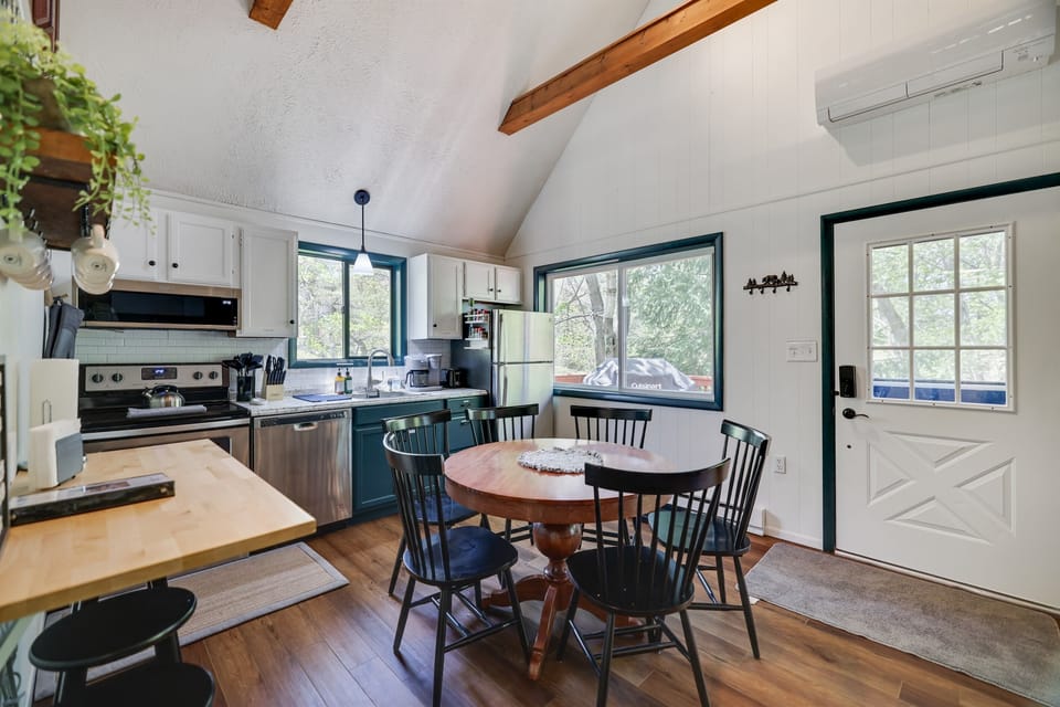 Outside deck entrance, easy access to grill while cooking. 