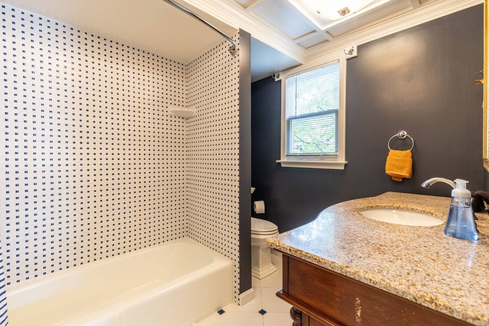 The 2nd floor Hall bath has a combo shower/bathtub.