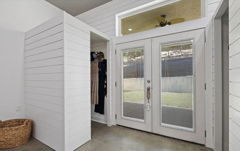 French door in the bedroom downstairs leads to the backyard.