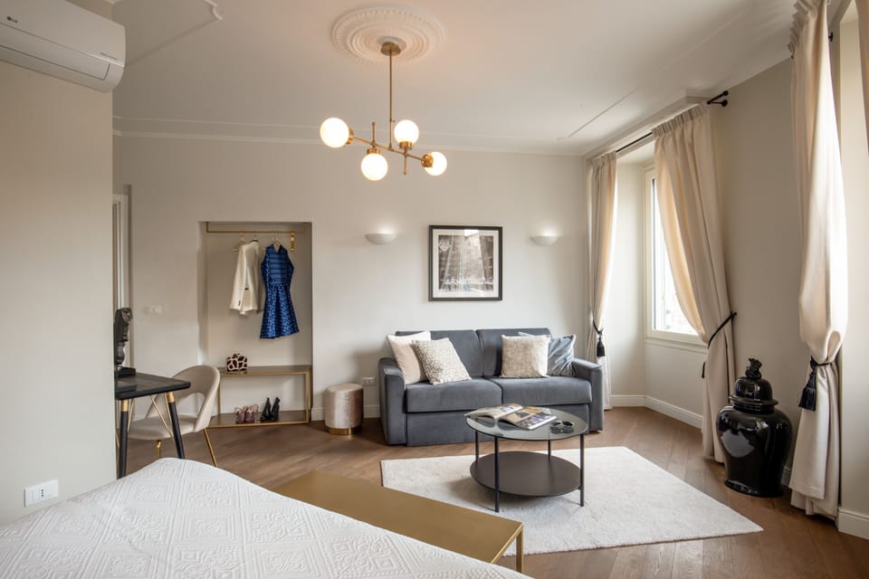 Junior Quadruple Room | Down comforters, free WiFi