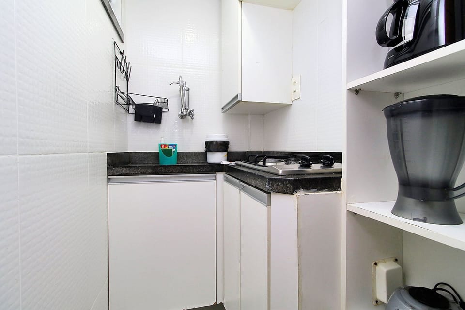 Fridge, microwave, blender, cookware/dishes/utensils