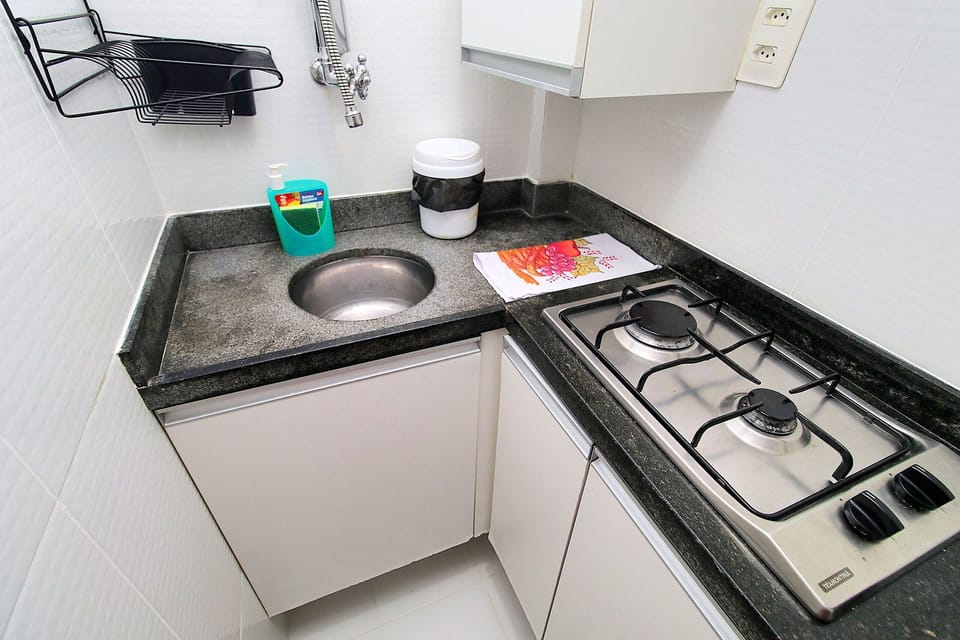 Fridge, microwave, blender, cookware/dishes/utensils
