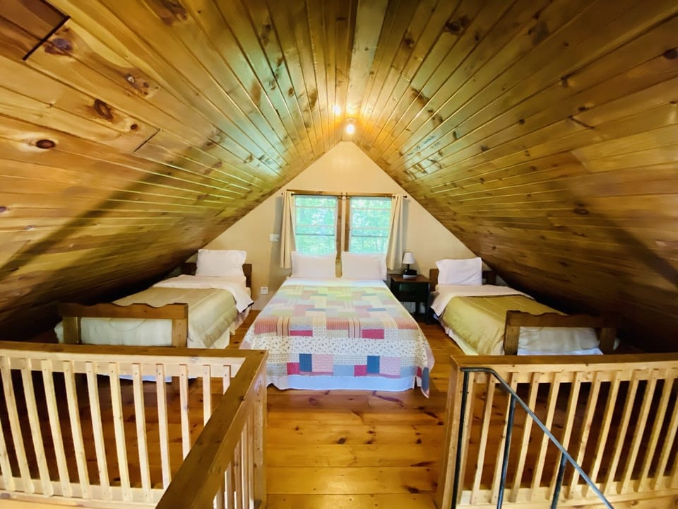 Right side of upstairs walk-up loft.