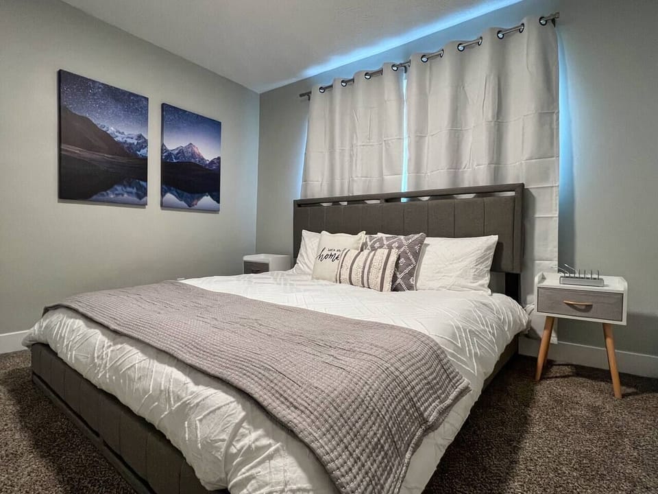 Comfortable master bedroom with a king size bed