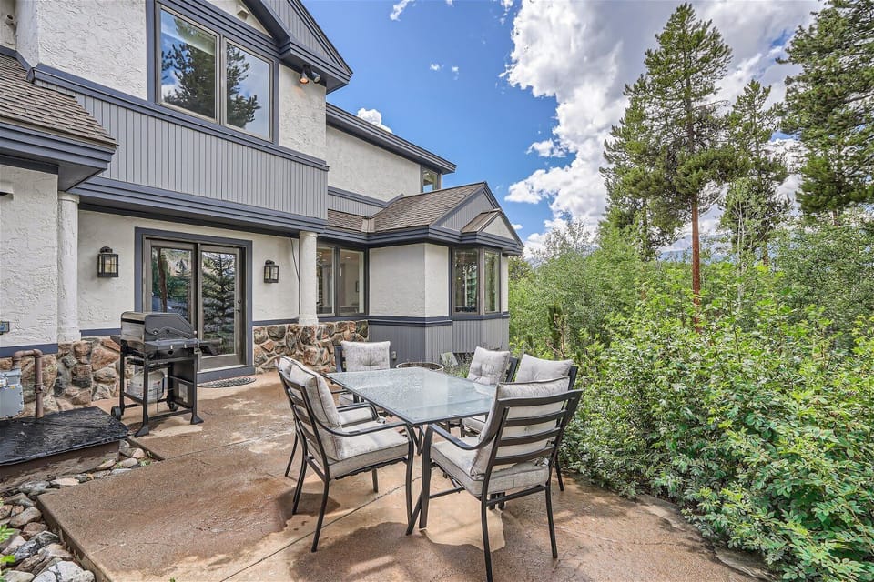 Outdoor area with grill accessed off of kitchen - main level