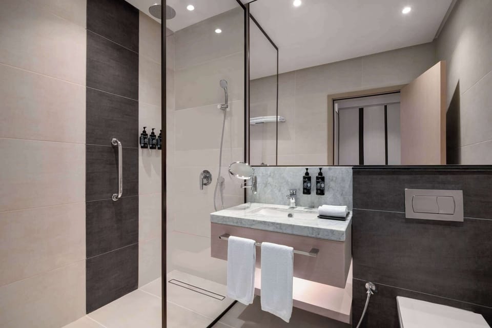Hair dryer, slippers, towels, soap