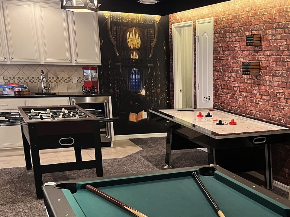 Play Foosball And Air Hockey