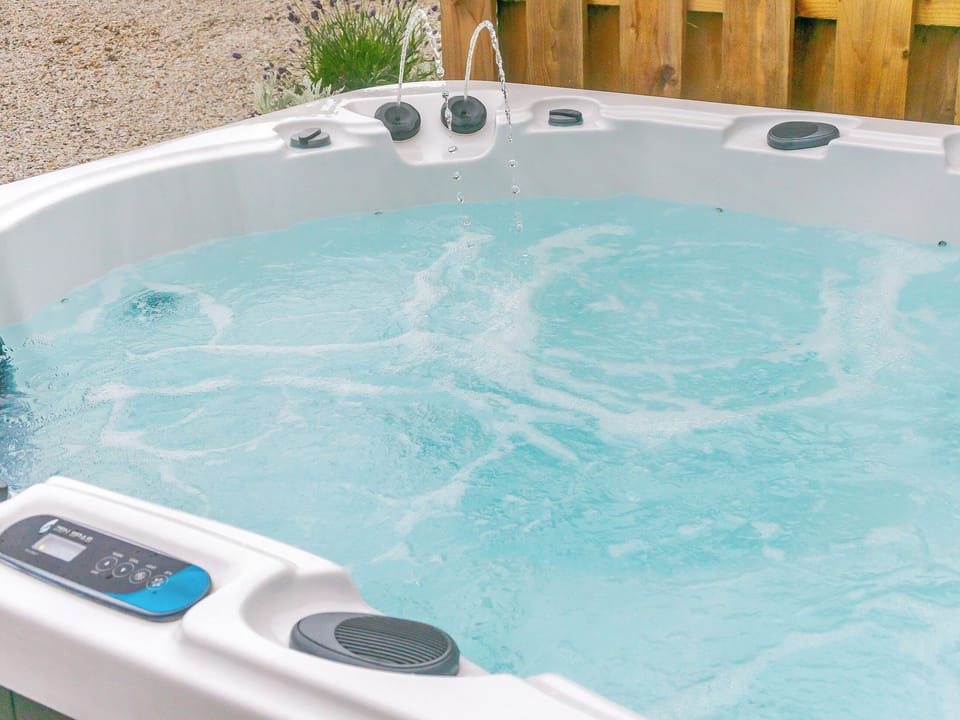 Hot tub | Orchard Cottage - Island Farm Cottages, Staintondale, near Whitby