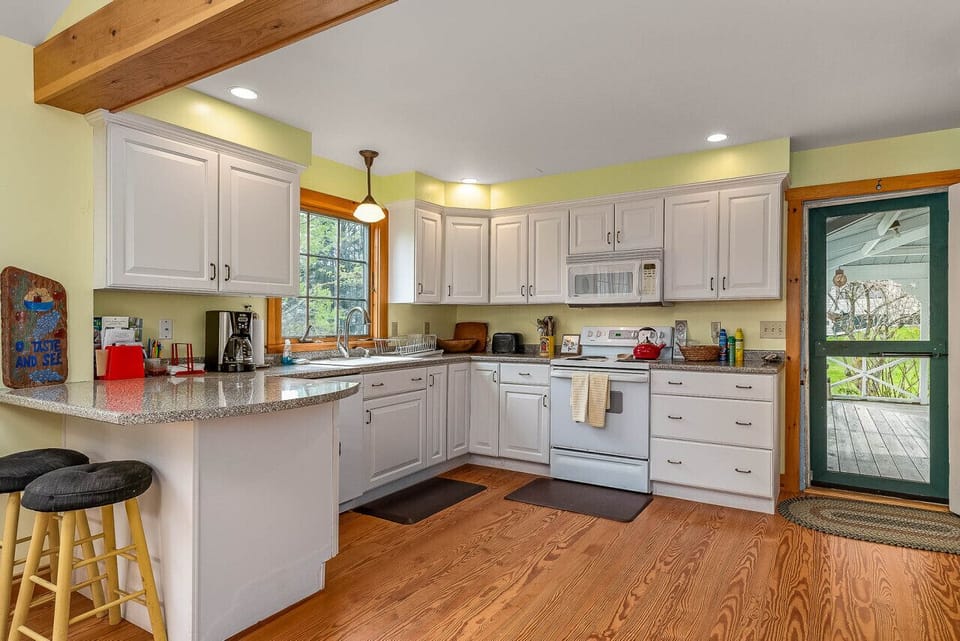 Spacious kitchen area with guest amenities