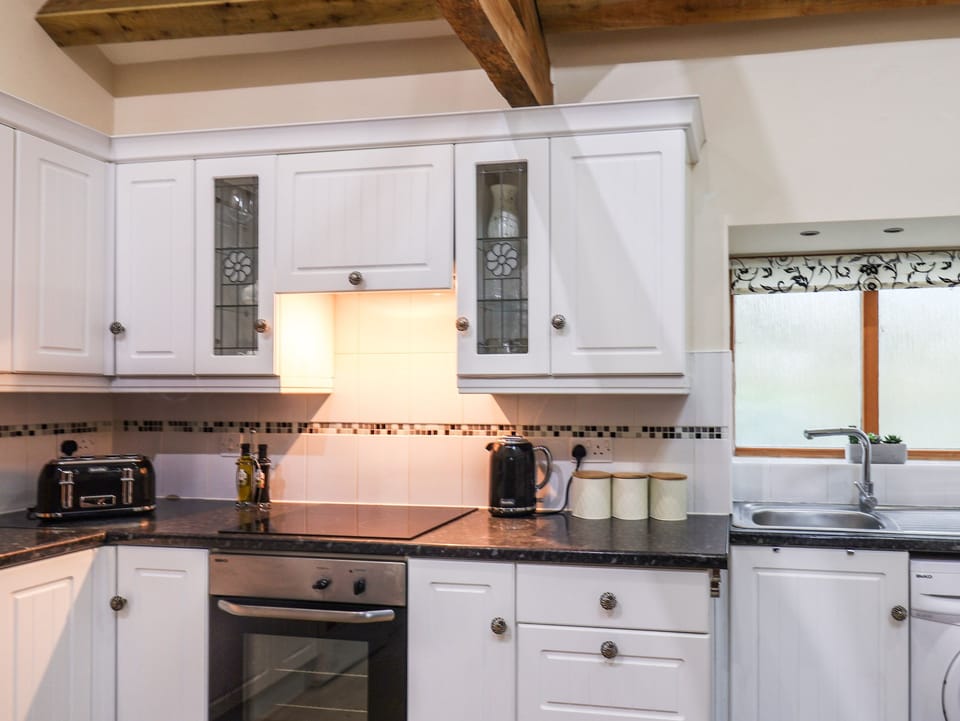 Fridge, electric kettle, toaster, cookware/dishes/utensils