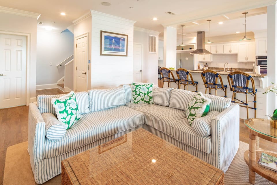There is an open floor plan layout between the living room, dining area and kitchen.