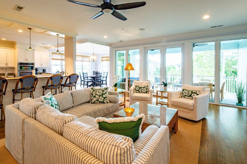 With nearly a full wall of windows, the living room, dining area and kitchen receives terrific sunlight.