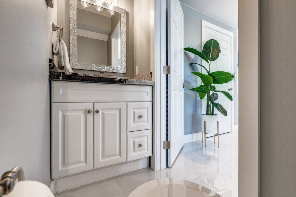 Conveniently located on the first level, the half bathroom offers easy access for guests.