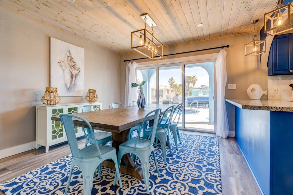 Savor a delightful meal while overlooking your private pool, adding an extra touch of relaxation and enjoyment to your dining experience at Blue Water