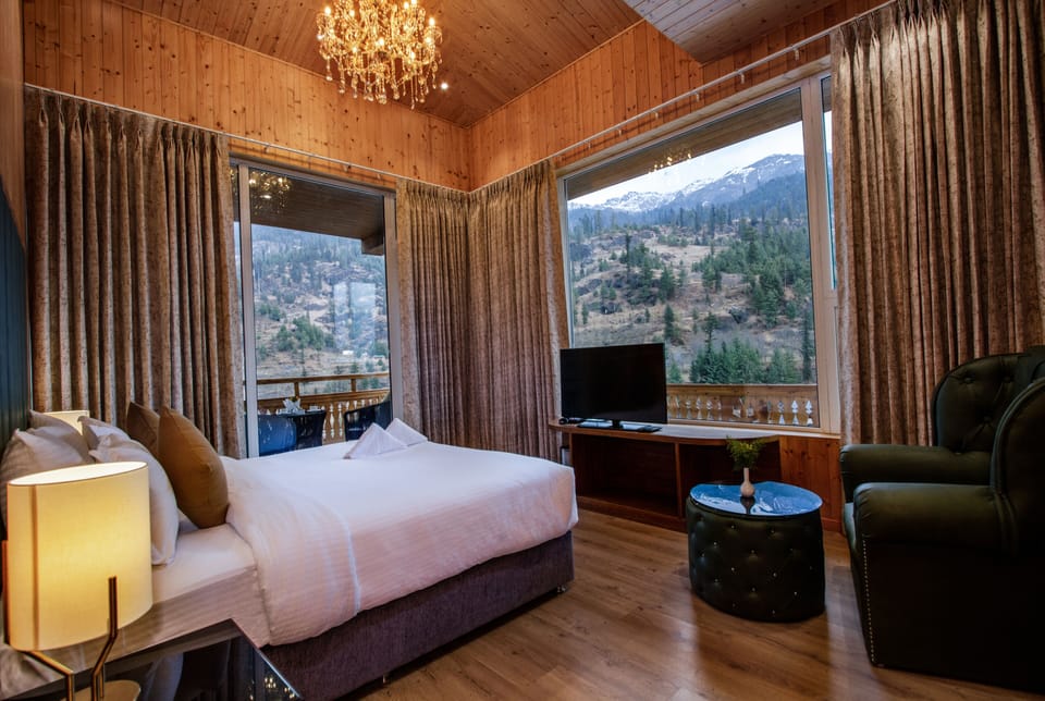 Family Suite, 1 King Bed, Mountain View | Premium bedding, individually decorated, individually furnished