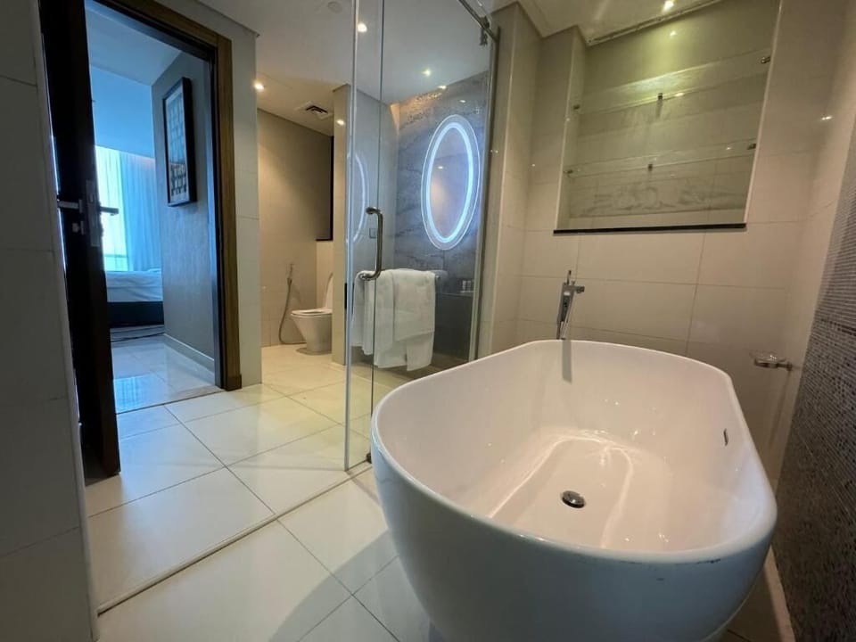 Family Apartment | Bathroom | Separate tub and shower, free toiletries, hair dryer, bathrobes