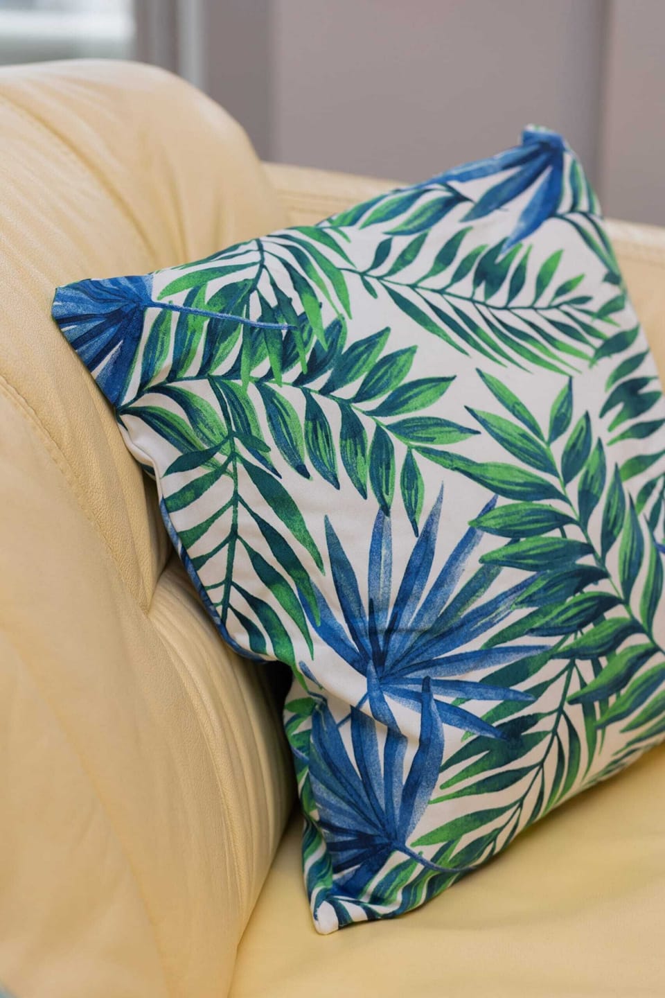 A close-up of decorative pillows, adding a touch of color and personality to the apartment.
