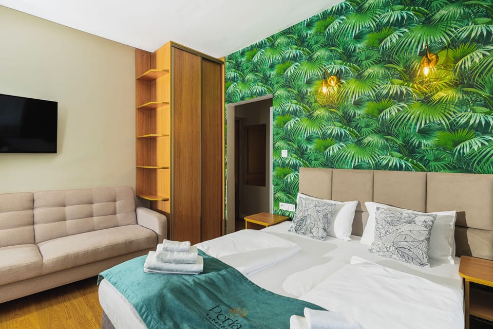 Comfort Triple Room, 1 Queen Bed with Sofa bed, Resort View | Individually decorated, individually furnished, desk, laptop workspace