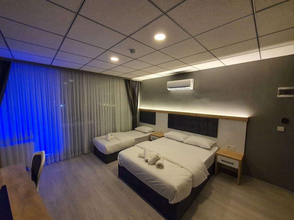 Family Triple Room | Premium bedding, minibar, free WiFi, bed sheets