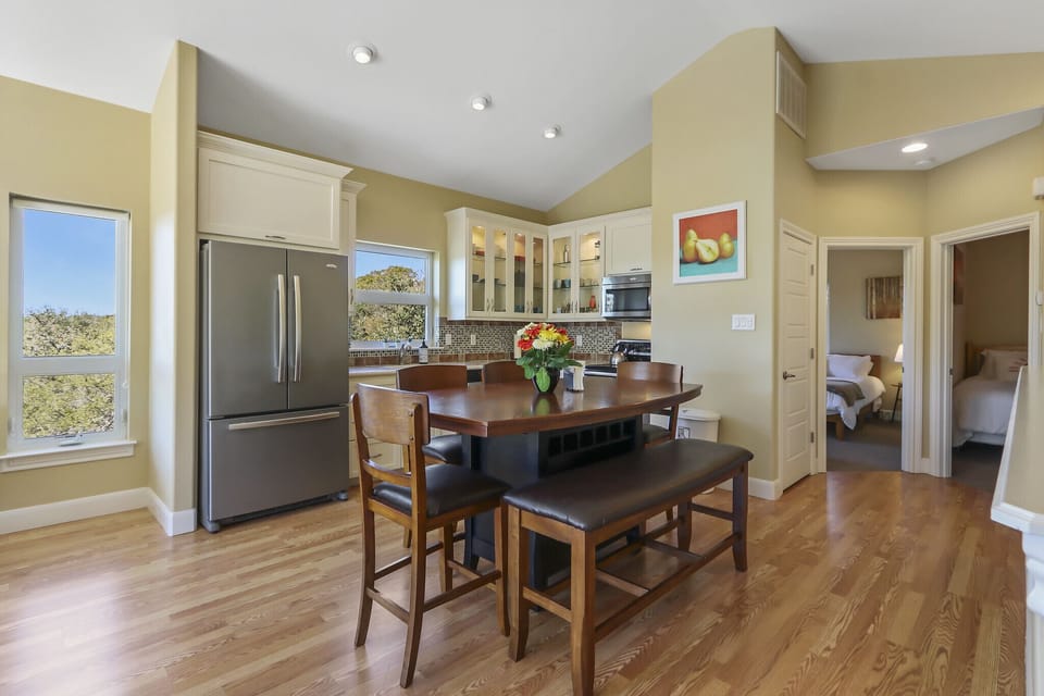 Attached to the living room is the dining and kitchen areas.