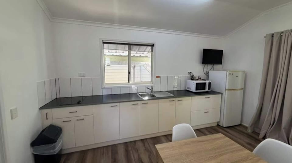 Superior 2 Bedroom Cabin | Private kitchenette | Fridge, microwave, stovetop, cookware/dishes/utensils