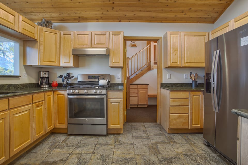 Kitchen with mud room in background