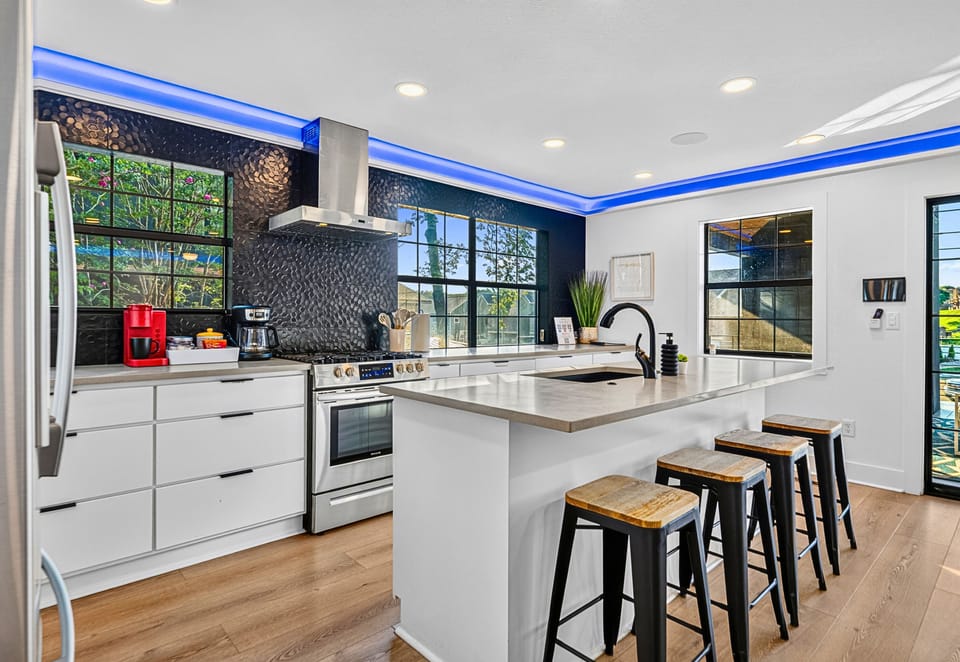 Whether you're making breakfast or preparing a holiday meal, the spacious island offers the perfect place to gather.