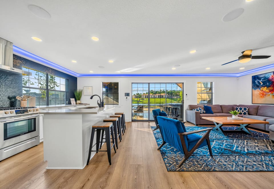 The open concept layout creates an inviting place to cook, dine, and spend quality time together while natural light fills the space.
