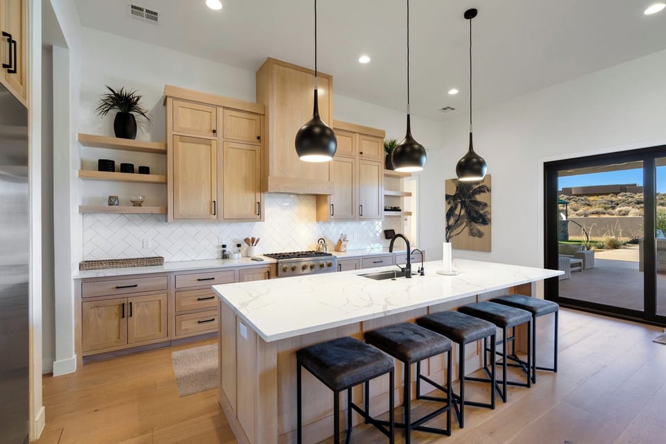 Kitchen Island - The Kitchen Island comfortably seats 5 adults and creates a great space for serving and preparing meals.