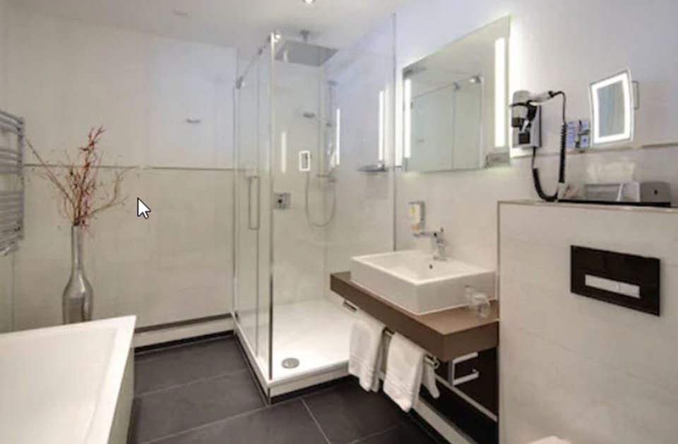 Shower, hair dryer, heated floors (bathroom), towels