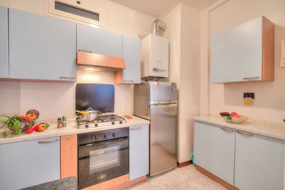 Standard Apartment, Multiple Bedrooms (Casa Letizia few min from sea) | Private kitchen | Fridge, stovetop, coffee/tea maker, toaster