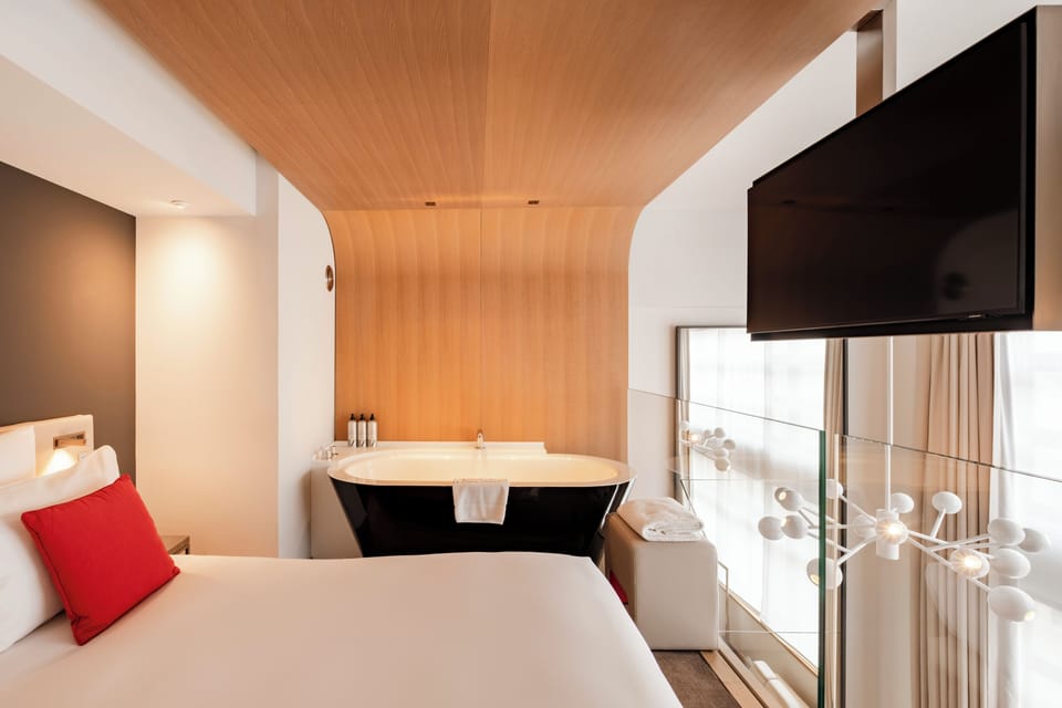 Duplex Room | Hypo-allergenic bedding, down comforters, in-room safe, blackout drapes