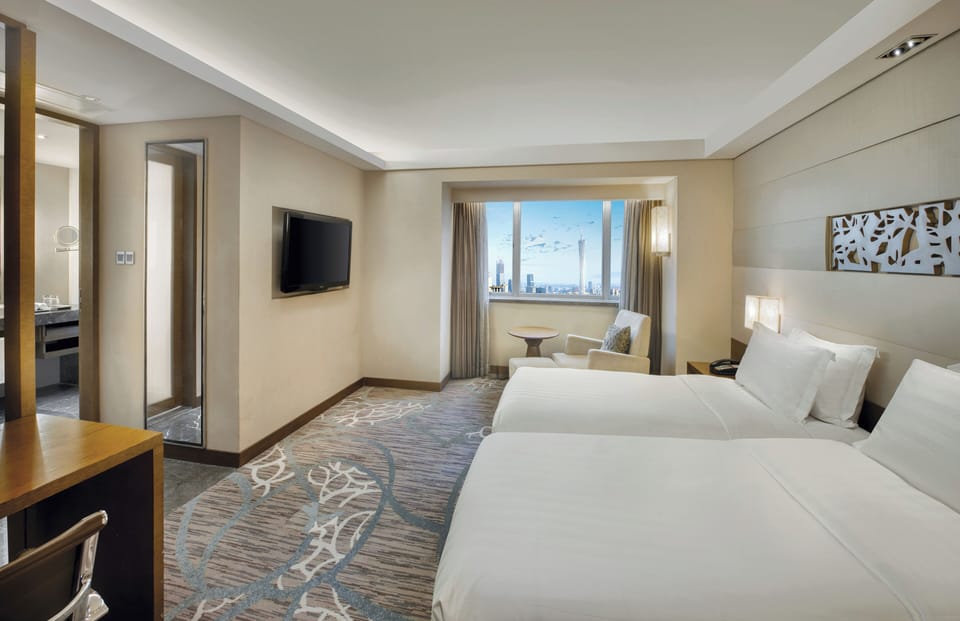 2 twin beds standard | Hypo-allergenic bedding, down comforters, minibar, in-room safe
