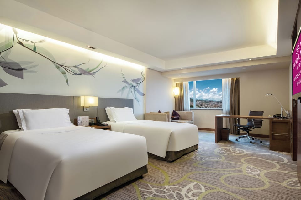 Premium Room, 2 Twin Beds, City View | Hypo-allergenic bedding available, down comforters, minibar