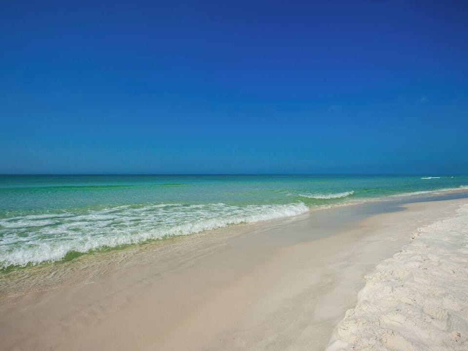 Walk to the emerald coast waters!