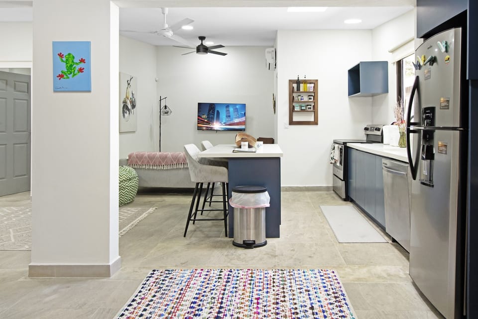 Casa Danta unit. Fully stocked kitchen with stove, dishwasher, microwave. Flatscreen TV in the lounge area