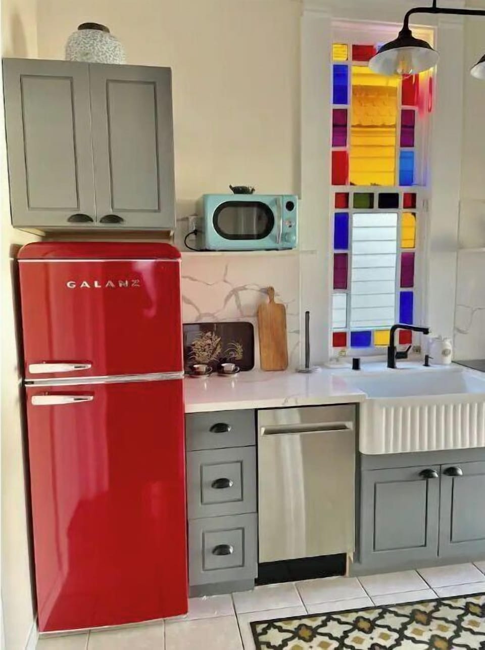 The kitchen goes in line with the historic character of the flat, yet is modern