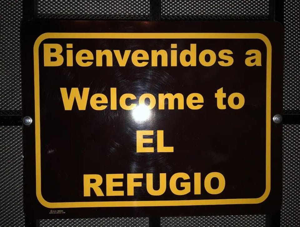 This sign indicates you are at the right door. 