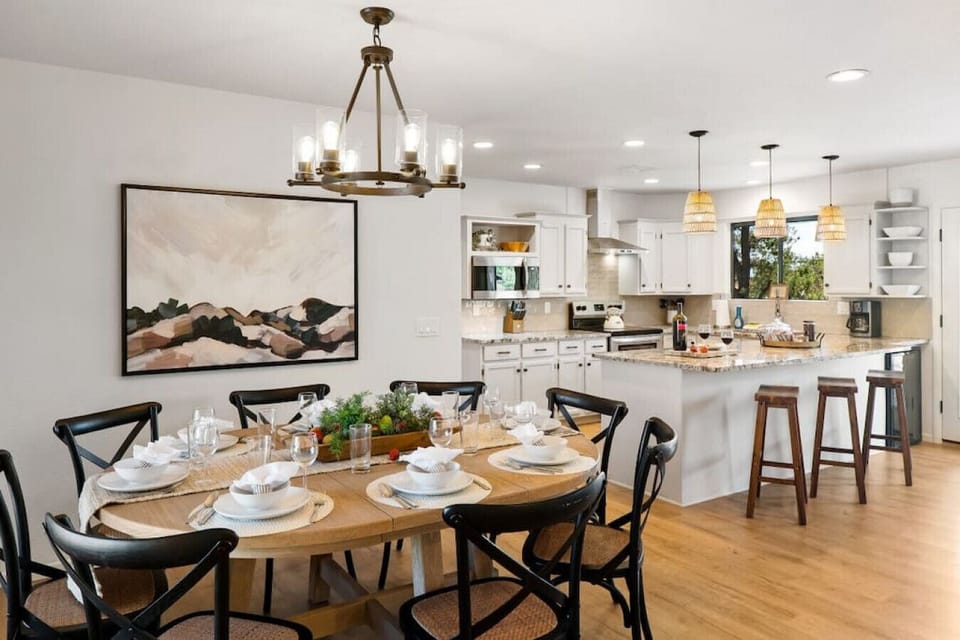 The dining table seats up to nine and the kitchen island seats an additional three