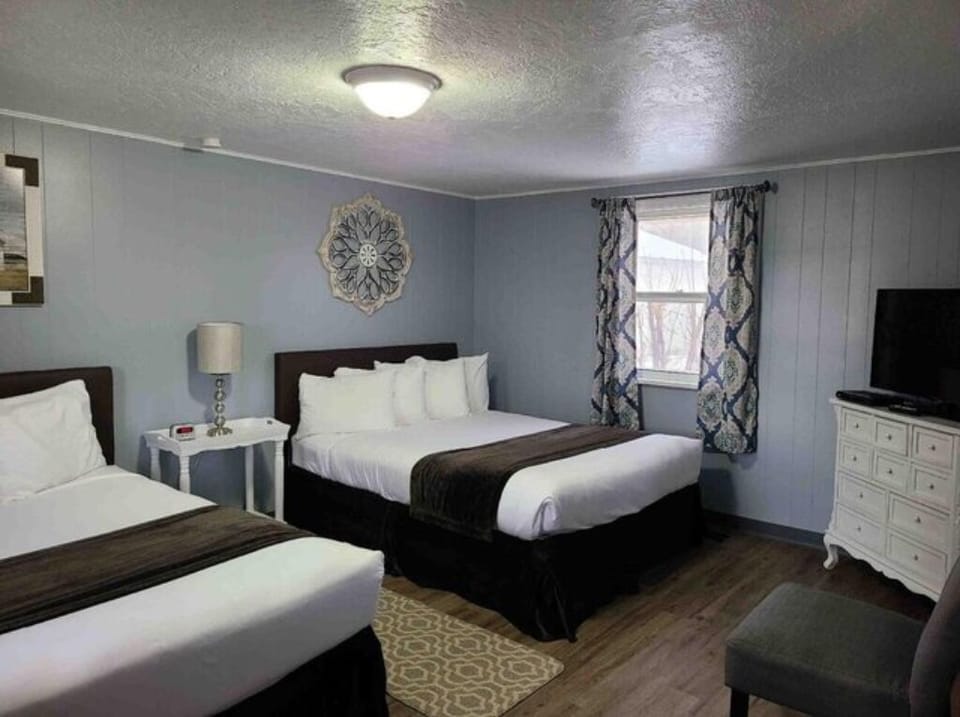 First bedroom with two queen beds
