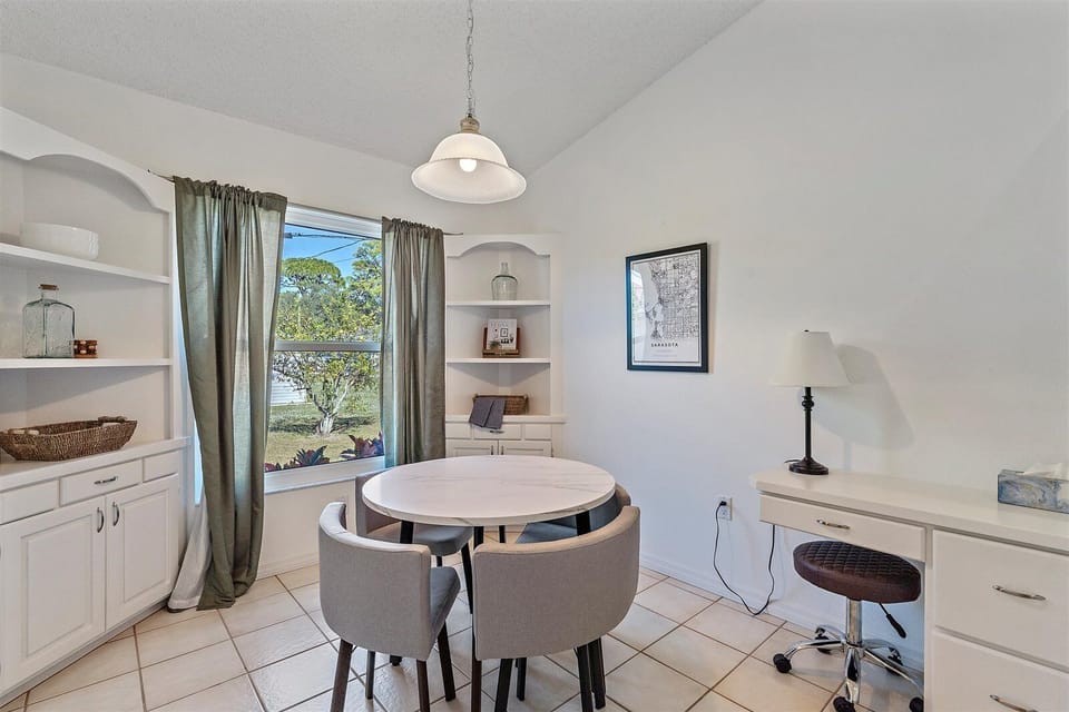 The breakfast nook just off of the kitchen is perfect for games or checking off your to-do list during vacation!