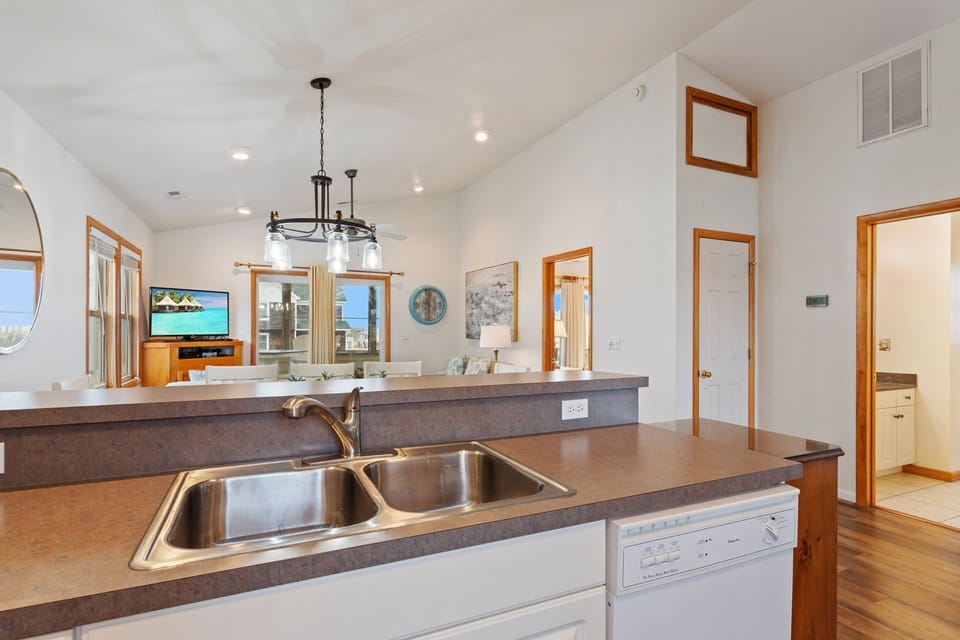 Whip up something delicious in the modern Kitchen with a Breakfast Bar for additional seating!